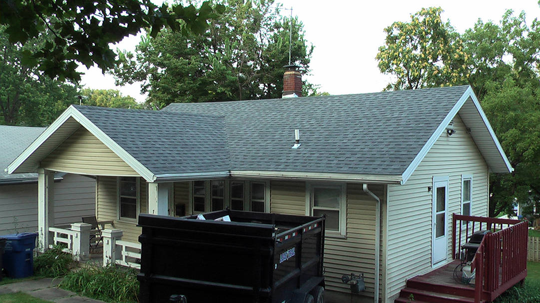 New grey shingle roof on a house in Urbandale, Iowa